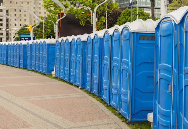 colorful portable restrooms available for rent at a local fair or carnival in Sterling City, TX